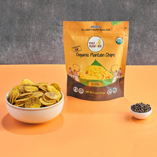 Desi Flavors Black Pepper organic plantain chips bag with a bowl of chips and whole peppercorns
